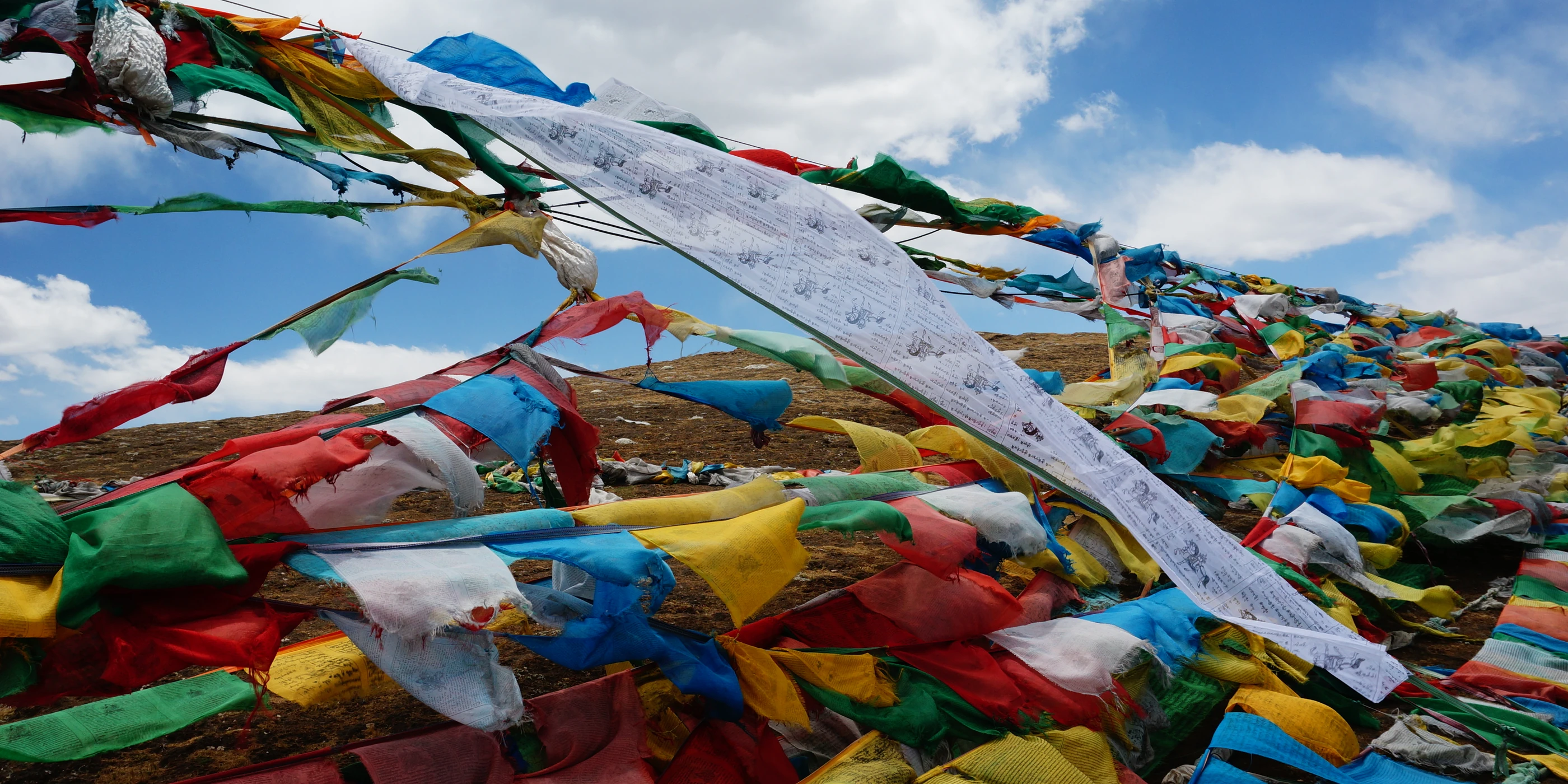 Prayer flags strung across the Kamba La pass in central Tibet