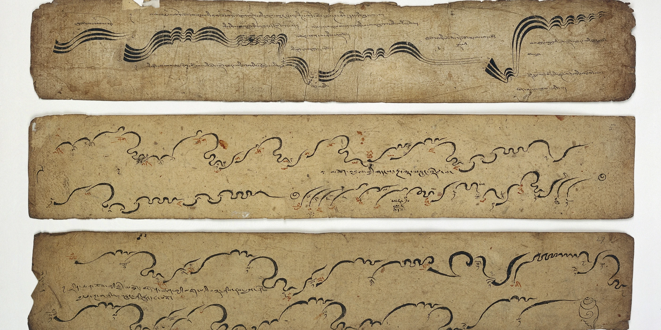 Leaves of a Tibetan manuscript, a musical score for monastic ritual, written in Tibetan script