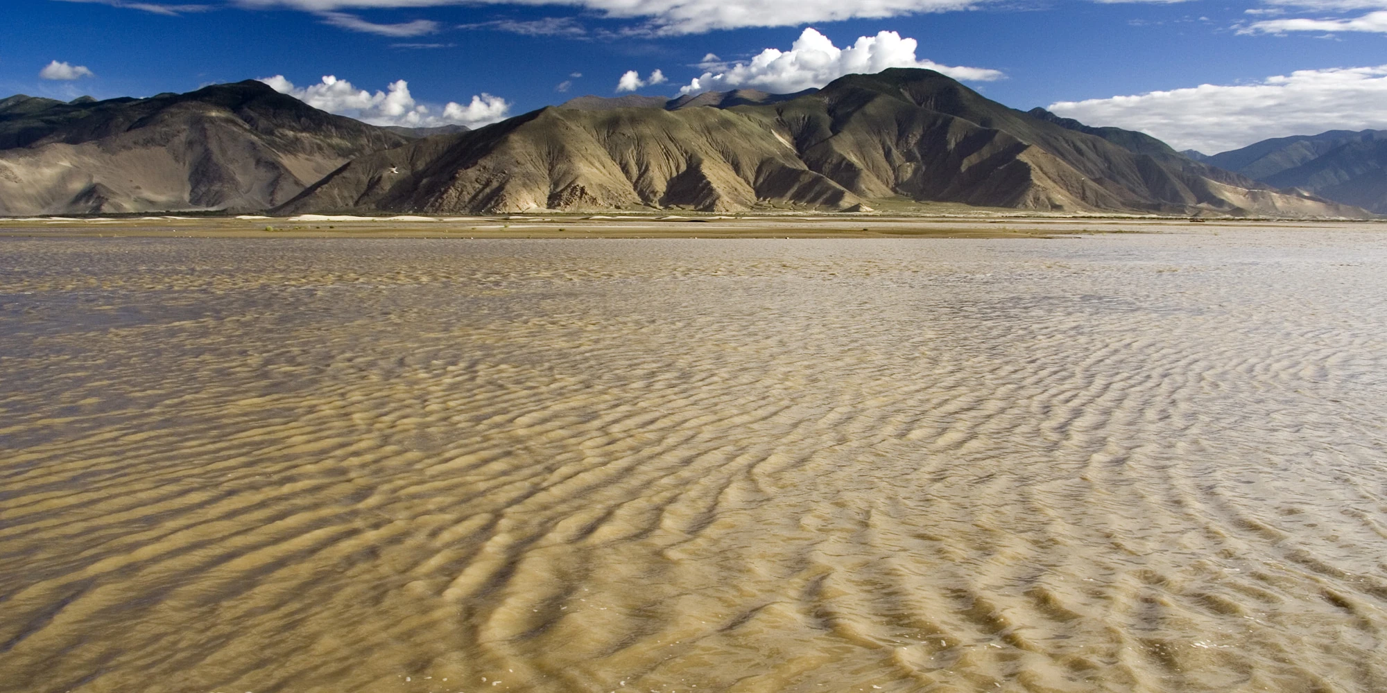 The Yarlung Tsangpo river winding through its valley in Tibet